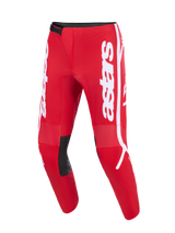 Alpinestars Pantaloni Fluid Apex 2026, pantaloni da motocross, rosso e bianco, con vistoso logo bianco sulle gambe, pannelli interni neri sulle ginocchia per il grip e design ergonomico pre-curvato per la guida off-road.