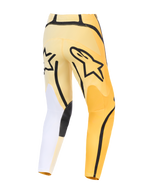 Alpinestars 2026 Fluid Apex Pants, pantaloni da motocross, giallo e nero con accenti bianchi, vista posteriore con logo Astars nero, design asimmetrico con pannelli rinforzati e vestibilità pre-curvata