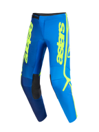 Alpinestars 2026 Fluid Apex Pants, pantaloni da motocross, blu e giallo fluo, con vistoso logo 'astars' verticale giallo, pannelli interni neri sulle ginocchia e design ergonomico pre-curvato per prestazioni off-road
