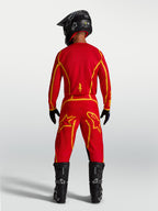 Alpinestars Pantaloni Fluid Apex V2, pantaloni da motocross uomo, rosso fuoco e oro, con seduta rinforzata, vista posteriore.