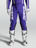 Alpinestars pantaloni Fluid Apex V2 2027, pantaloni da motocross da uomo blu scuro e bianchi, indossati per l'off-road.