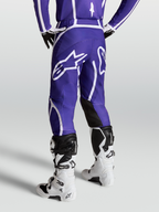 Alpinestars Pantaloni Fluid Apex V2, pantaloni motocross da uomo, blu e bianco, logo a stella posteriore e taglio 3D ergonomico.