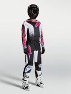 Alpinestars pantaloni Fluid Drag, completo da motocross da uomo in nero e bianco con accenti rosso fluo.