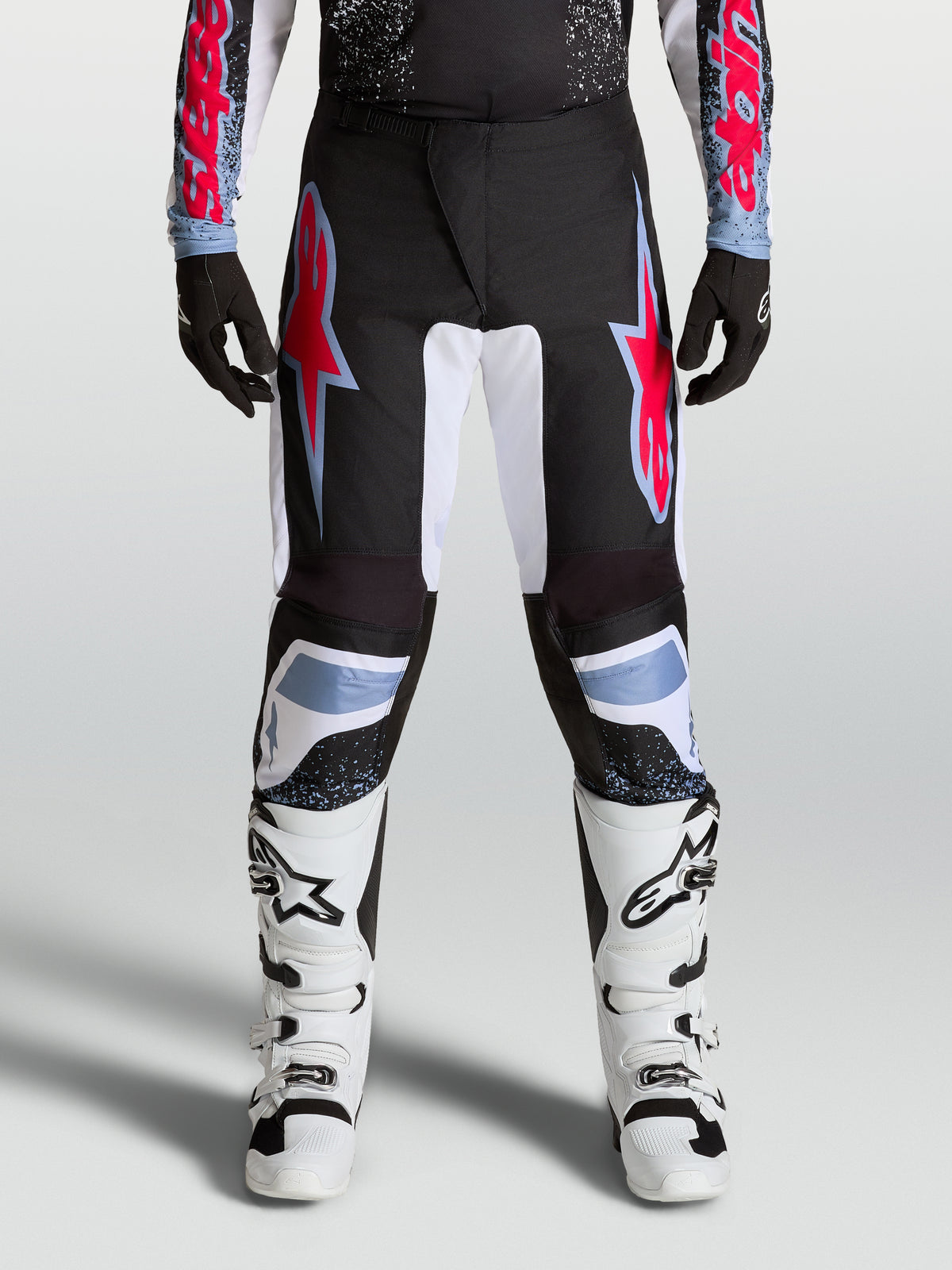 Alpinestars pantaloni Fluid Drag, pantaloni motocross da uomo neri e rossi, in resistente politessuto 600D rinforzato.