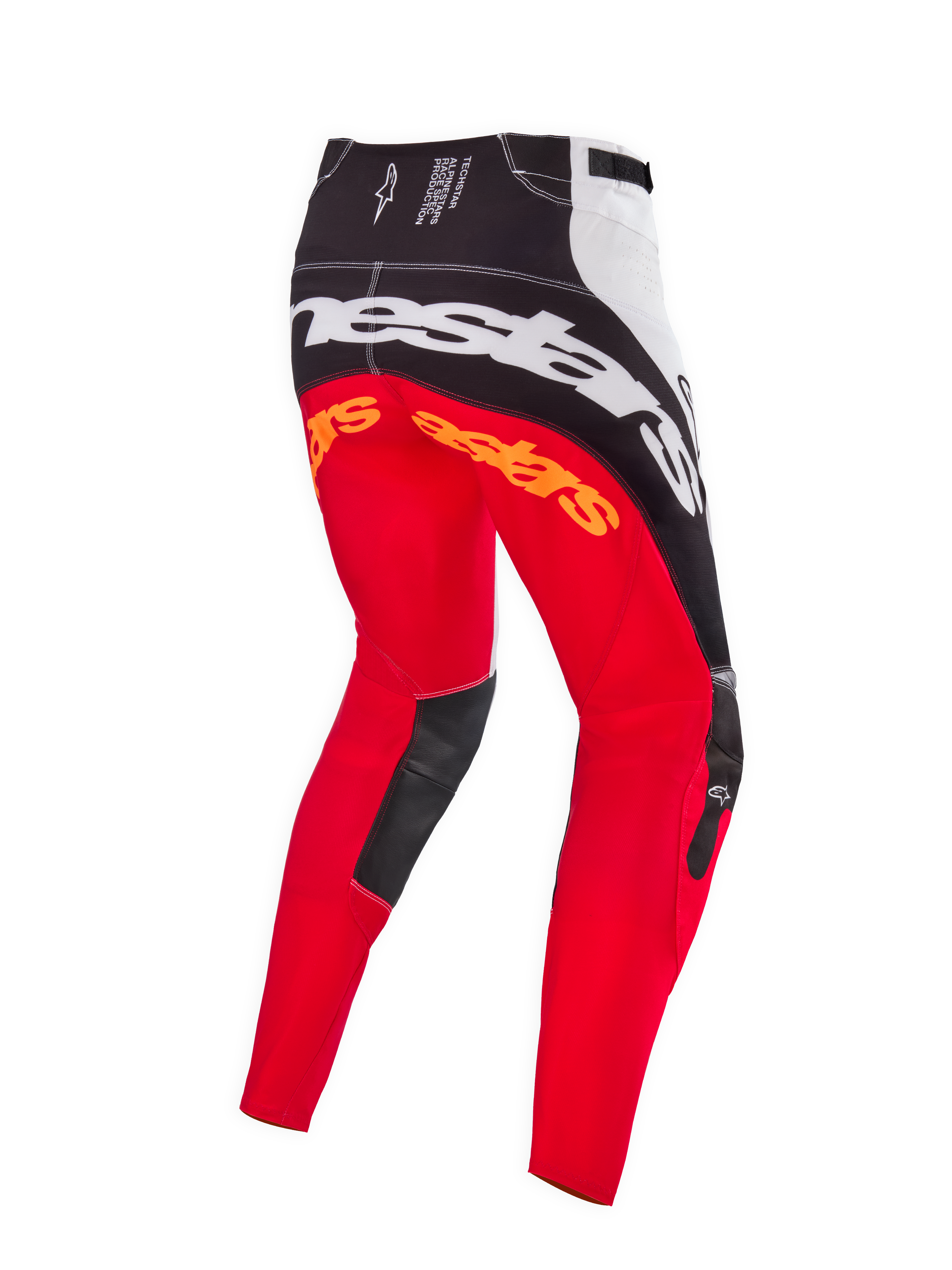 Alpinestars Limited Edition Techstar Deep Pants, pantaloni da motocross, colorazione Black White High Red, vista posteriore con grande marchio Alpinestars bianco sulla seduta, loghi arancioni sulla parte superiore delle gambe e pannelli interni del ginocchio in pelle nera, progettati per il racing fuoristrada professionale