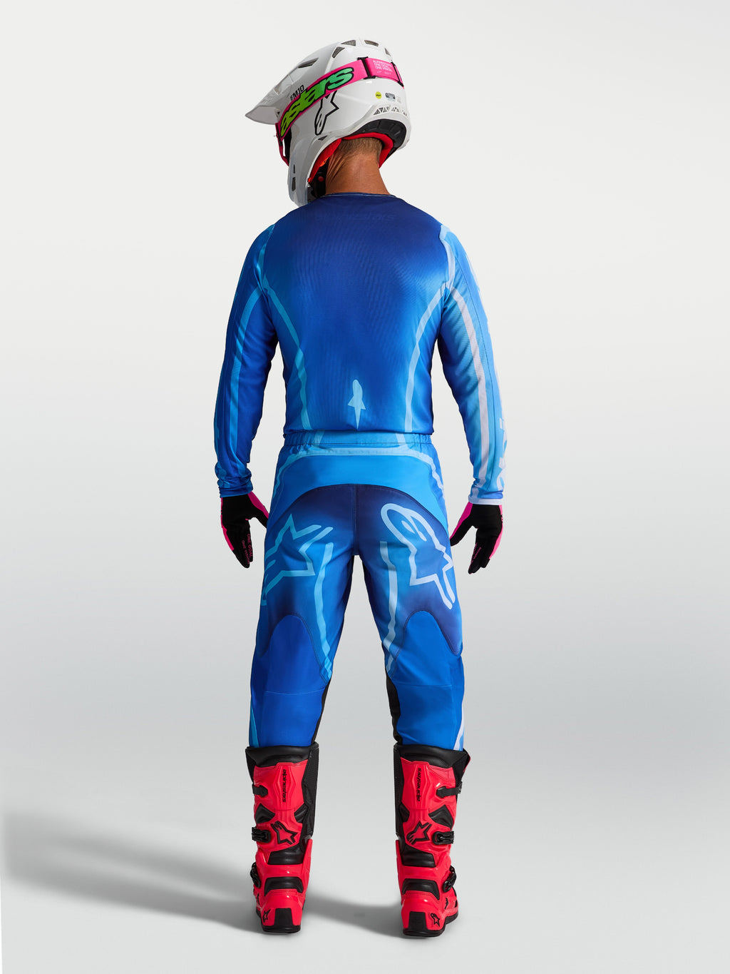 Alpinestars Pantaloni Fluid Kepler, pantaloni da motocross da uomo, blu, vista posteriore con vestibilità ergonomica.