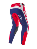 Alpinestars Limited Edition Techstar Fortitude Pants, pantaloni da motocross, rosso brillante, bianco e blu, vista posteriore con pannelli blu e accenti rossi e bianchi, loghi a stella bianchi sulle cosce e branding Techstar sulla vita.