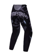 Pantaloni Alpinestars Techstar Beast Coast Edizione Limitata, retro nero e grigio con grafica gotica per il motocross.