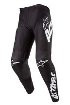 Alpinestars 2024 Racer Hana Pants, pantaloni da motocross, nero e bianco, con loghi Alpinestars bianchi, design ergonomico pre-curvato, equipaggiamento protettivo per fuoristrada