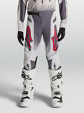 Alpinestars pantaloni Supertech Swan ragazzo, pantaloni da motocross grigi e bianchi con accenti rossi, per giovani piloti.
