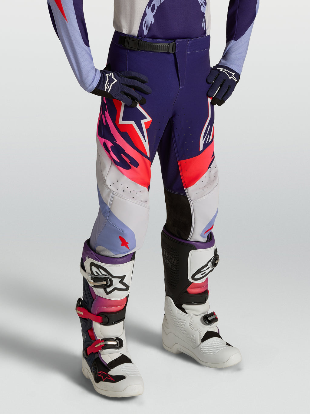 Alpinestars pantaloni Supertech Dyna ragazzo 2027, pantaloni da motocross viola e rosa fluo in tessuto rip-stop elasticizzato.