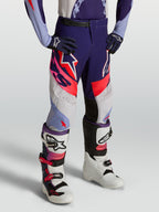 Alpinestars pantaloni Supertech Dyna ragazzo 2027, pantaloni da motocross viola e rosa fluo in tessuto rip-stop elasticizzato.