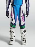 Alpinestars pantaloni Supertech Maven ragazzo, pantaloni motocross bianchi e blu, accenti verde fluo, vestibilità atletica.