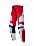 Alpinestars Youth Racer Veil Pants 2025, pantaloni da motocross per ragazzi, rosso acceso e bianco con dettagli blu, con pannelli interni neri sulle ginocchia, design ergonomico precurvato e politessuto resistente per gare fuoristrada.