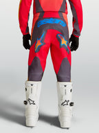 Alpinestars Pantaloni Fluid Hunt Ragazzo 2027, pantaloni da motocross rossi e grigi con logo blu e grafiche a stella
