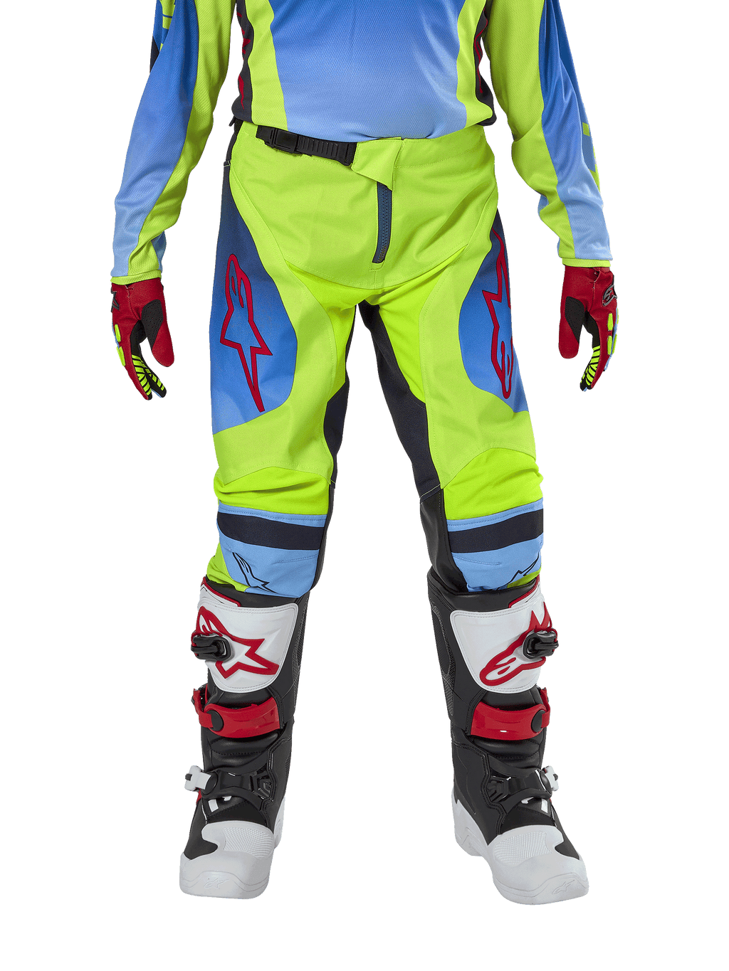 Alpinestars pantaloni Youth Racer Hoen 2024, pantaloni da motocross, giallo fluo e blu navy, con loghi a stella rossi sulle cosce, indossati con maglia coordinata, guanti rossi e neri e stivali da motocross bianchi, neri e rossi, equipaggiamento resistente per il fuoristrada