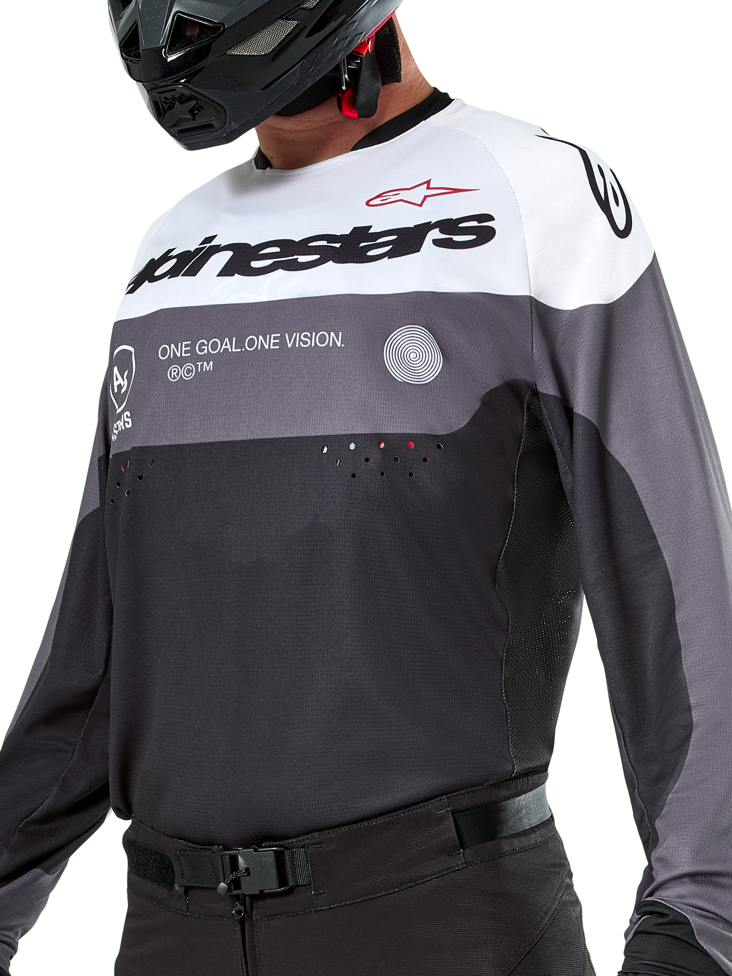 Maglia Alpinestars Pro-Dura, maglia da motocross ed enduro, nero, grigio magnet e bianco, abbigliamento tecnico off-road con perforazioni tagliate al laser e costruzione in tessuto poliestere traspirante.