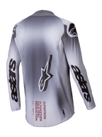 Alpinestars Maglia Supertech Maker 2025, maglia motocross da uomo, argento e nero, vista posteriore con struttura in mesh elasticizzato e marchio