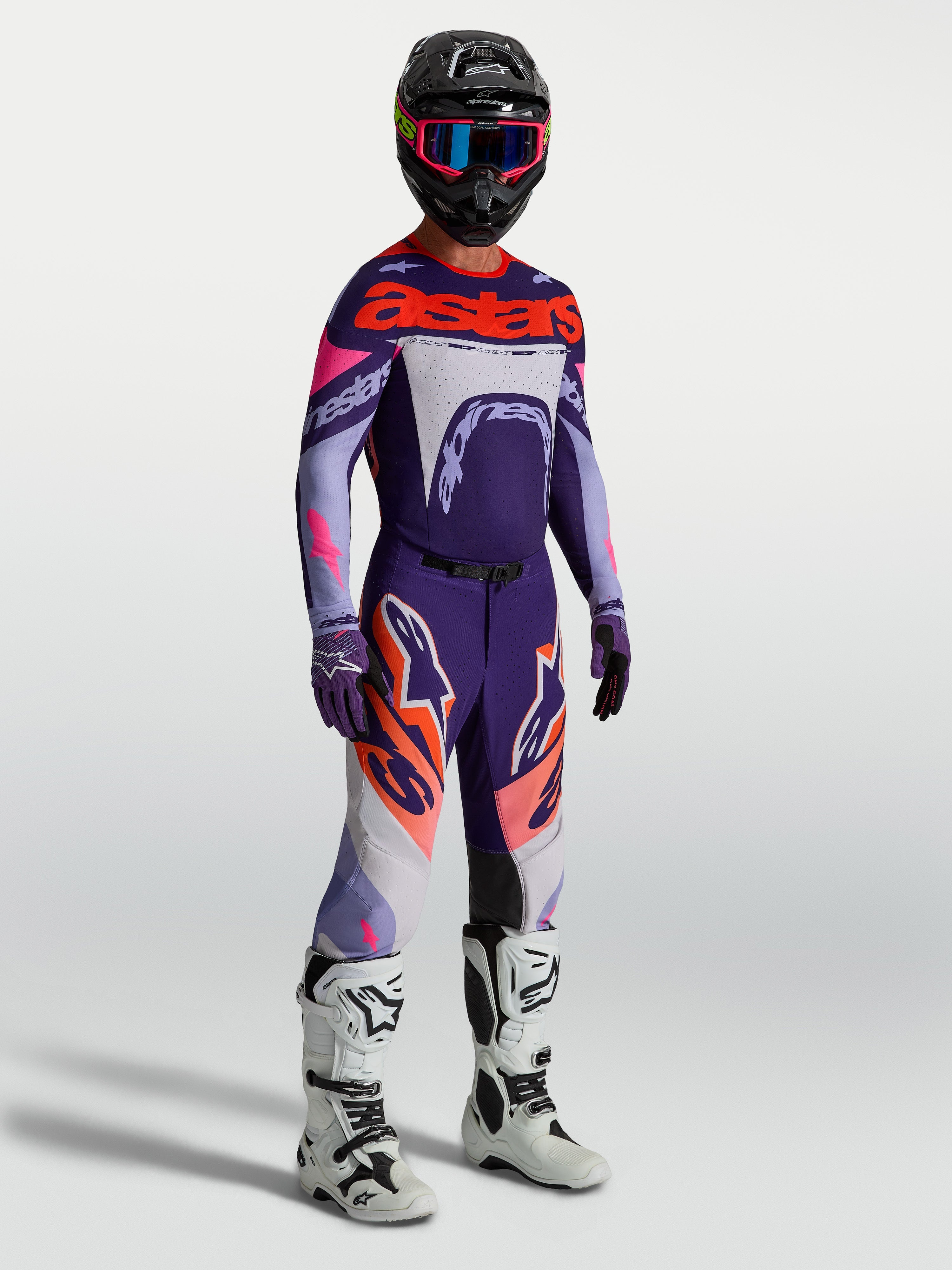 Alpinestars Supertech Dyna Gear Set, completo motocross da uomo, viola e rosa fluo, in mesh con vestibilità atletica.