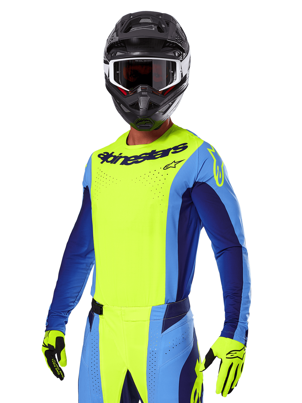Set Gear Alpinestars Techstar Melt 2025, pilota di motocross con maglia giallo brillante e blu e pantaloni coordinati, casco nero con occhiali bianchi e neri, guanti gialli, abbigliamento da corsa off-road con logo Alpinestars e dettagli traforati