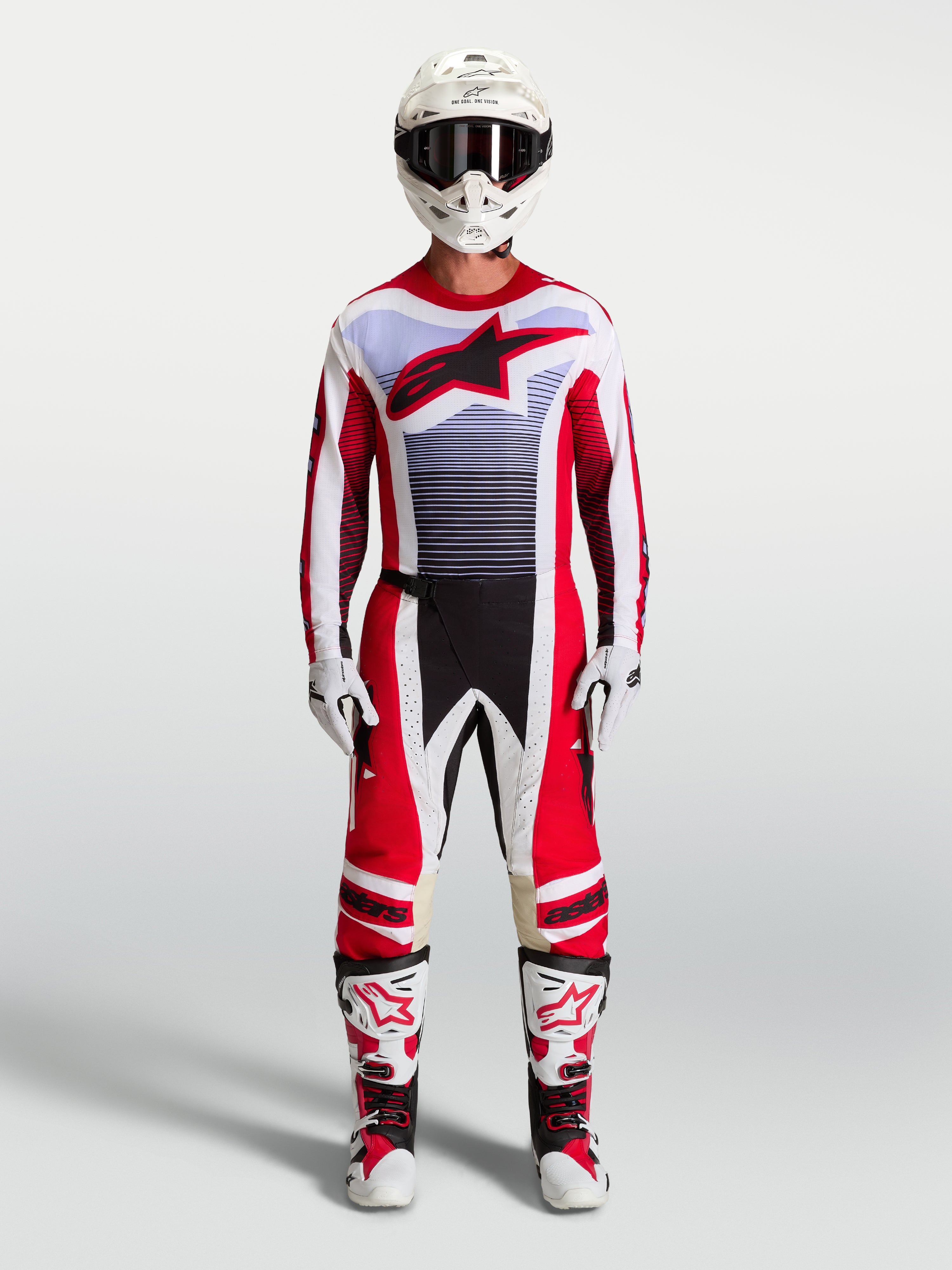 Alpinestars maglia Techstar Maven e completo motocross da uomo, rosso e bianco, vestibilità atletica da gara.