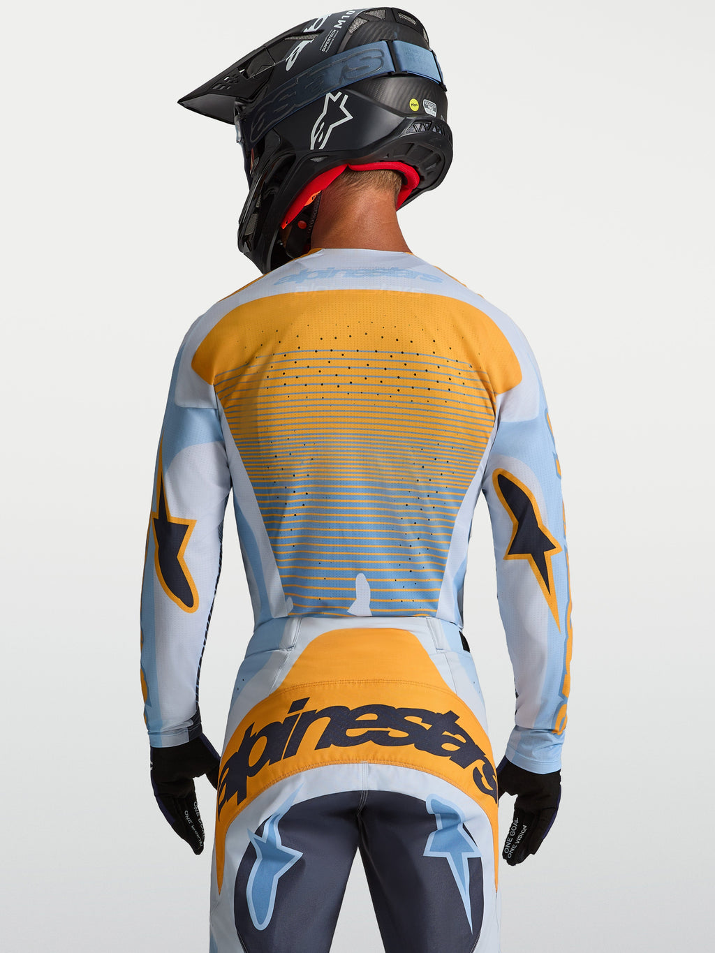 Maglia Techstar Maven Alpinestars, maglia motocross uomo, blu e arancione, vista posteriore con ventilazione laser-cut.