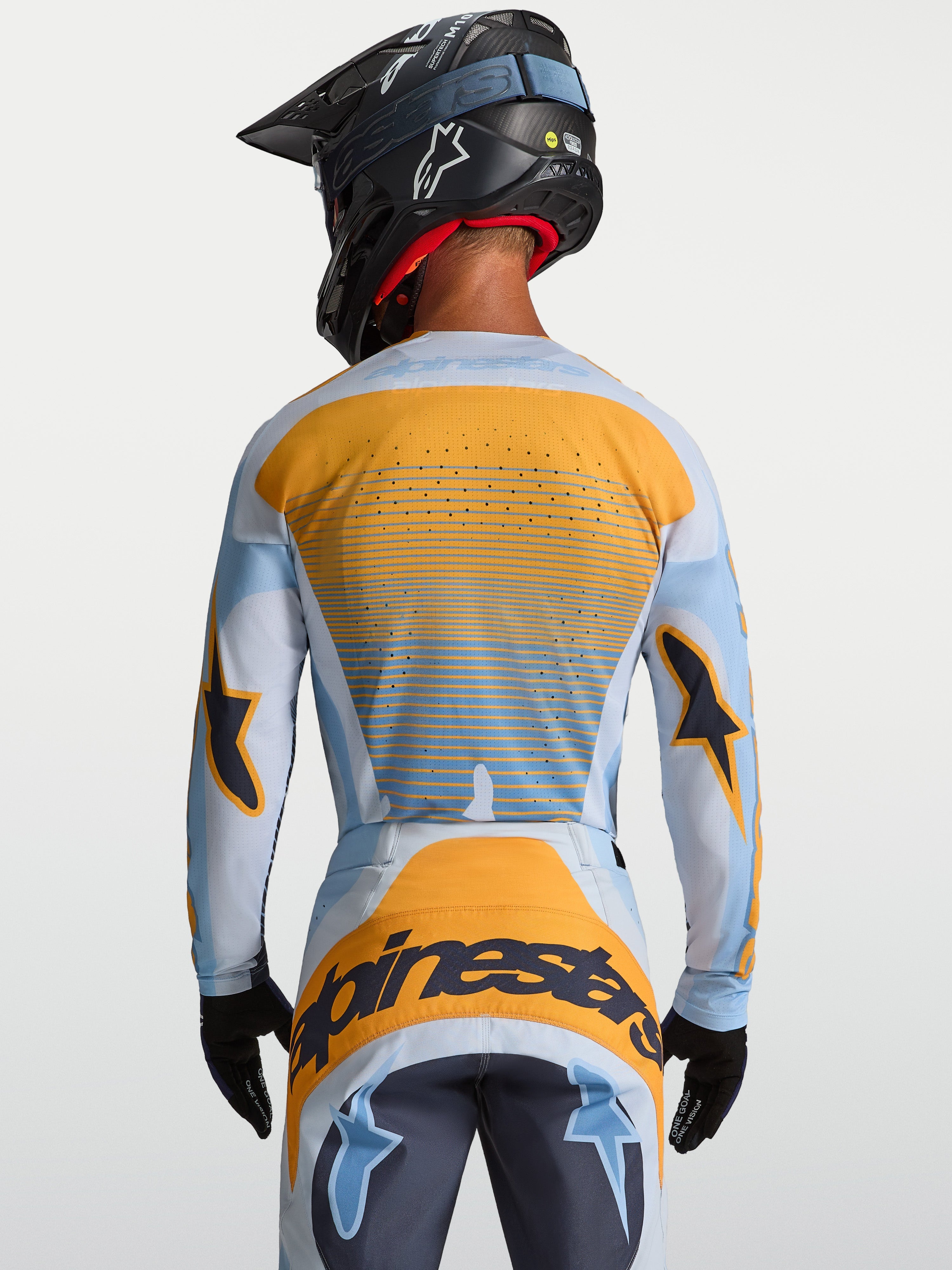 Maglia Techstar Maven Alpinestars, maglia motocross uomo, blu e arancione, vista posteriore con ventilazione laser-cut.
