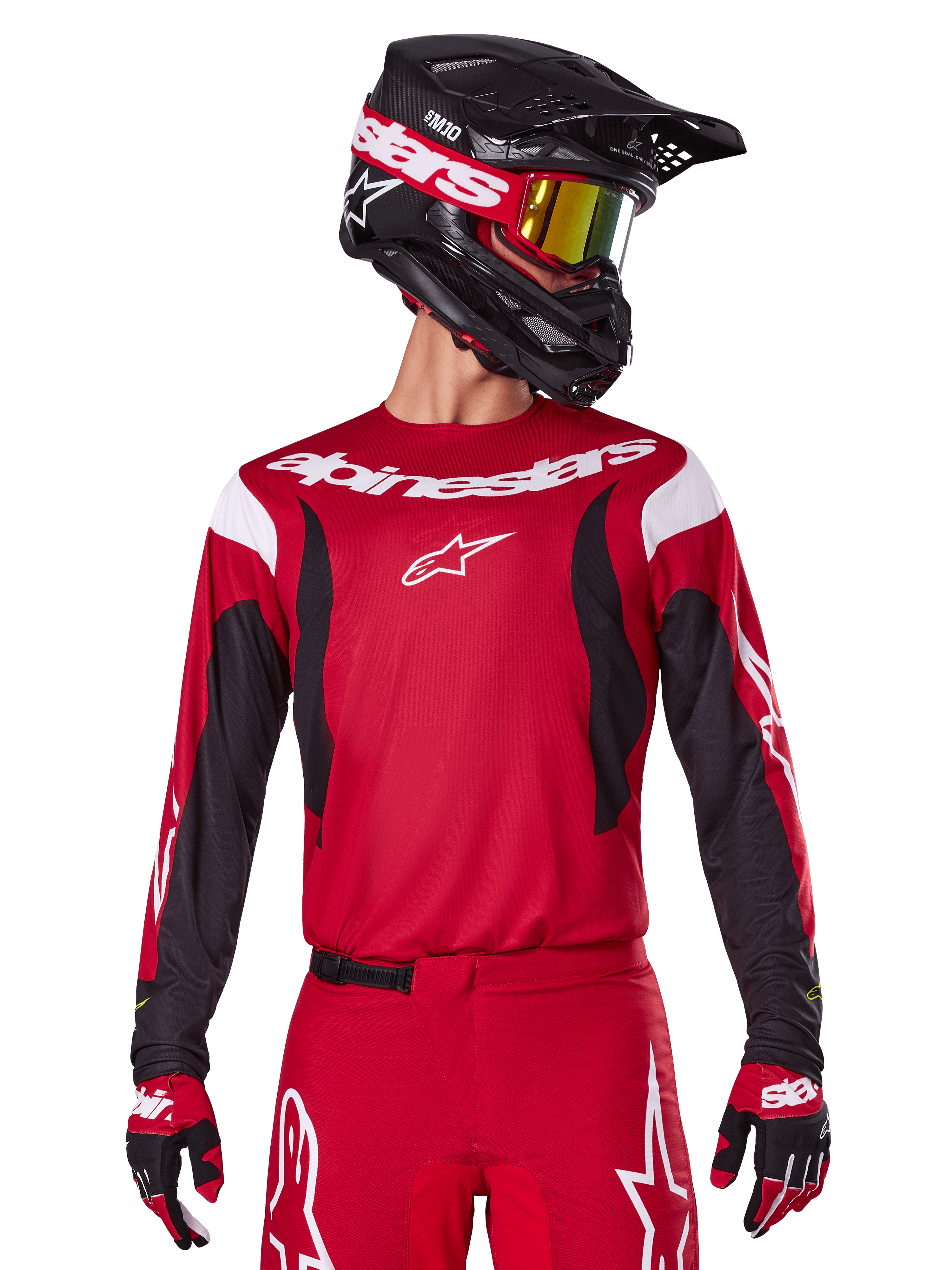 Maglia e completo Fluid Haul 2025 Alpinestars, abbigliamento da motocross da uomo, rosso brillante e nero, con casco e guanti.
