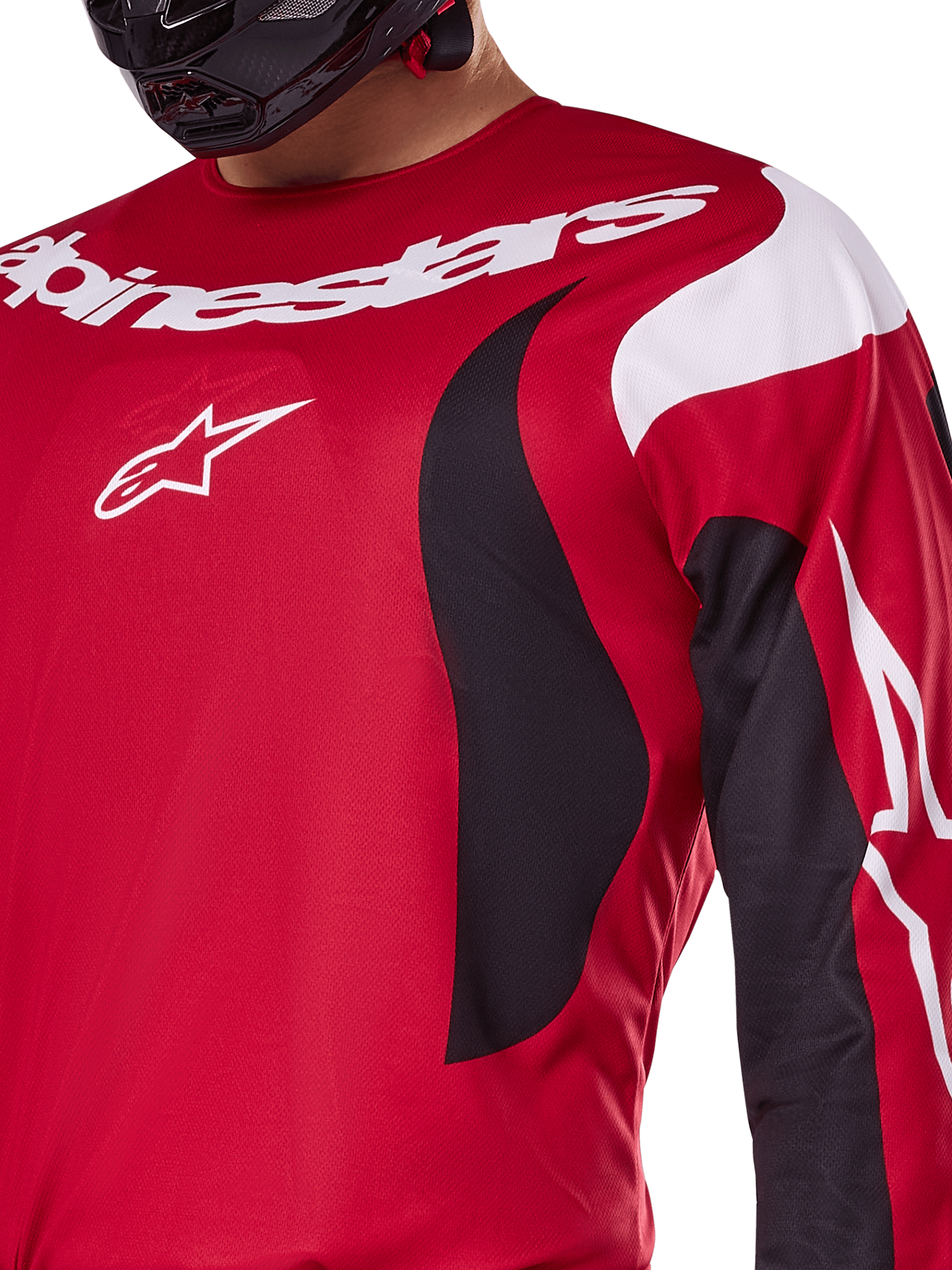 Maglia Alpinestars 2025 Fluid Haul, rosso acceso e nero, vista ravvicinata di petto e braccio con logo Alpinestars bianco, design ergonomico sportivo con accenti dinamici neri e bianchi per prestazioni da motocross.