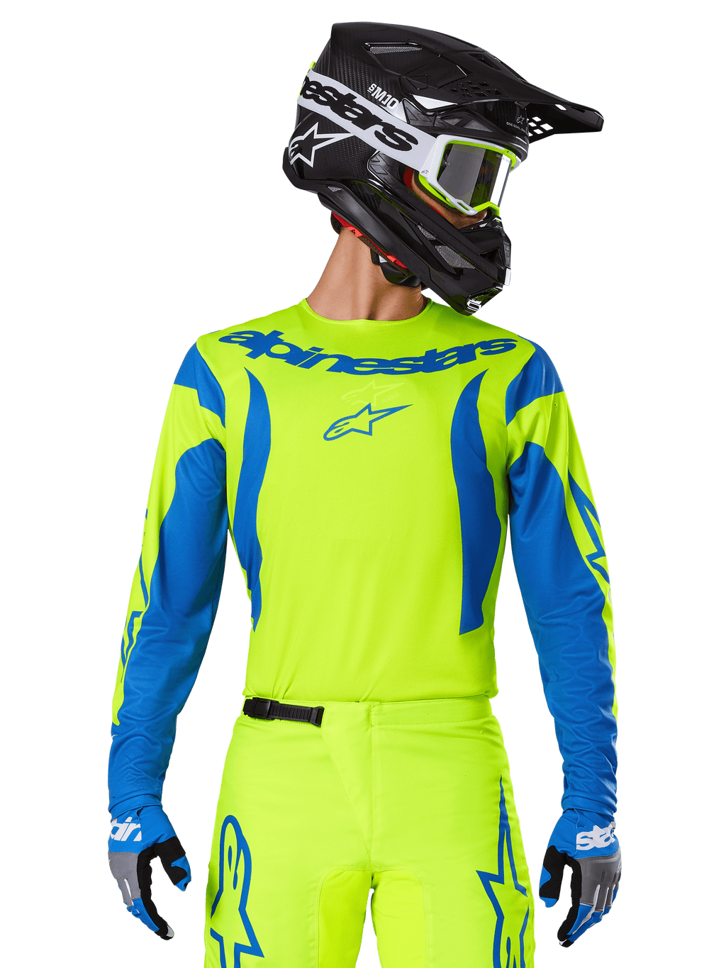 Alpinestars 2025 Fluid Haul Jersey, maglia da motocross, giallo neon e blu, con logo Alpinestars blu sul petto, indossata con equipaggiamento coordinato tra cui casco nero e guanti blu, vestibilità atletica per il fuoristrada