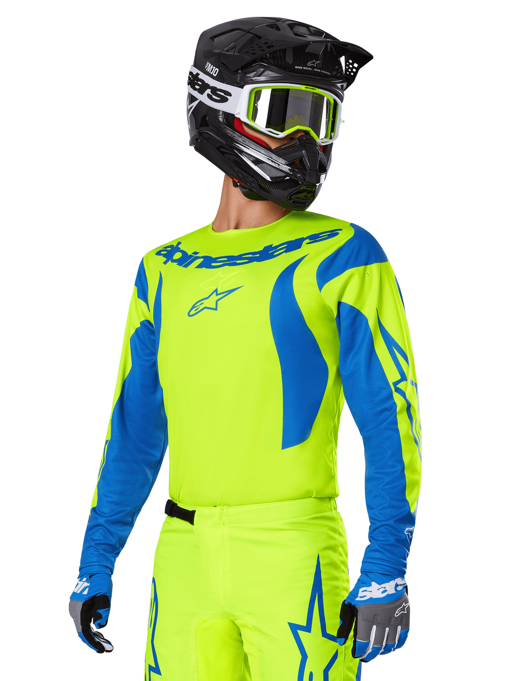 Alpinestars 2025 Fluid Haul Gear Set, maglia e pantaloni da motocross, giallo brillante e blu, indossato con casco nero e occhiali con montatura gialla, caratterizzato da motivi blu a onda sulle maniche e loghi a stella blu sui pantaloni, completo da gara fuoristrada coordinato