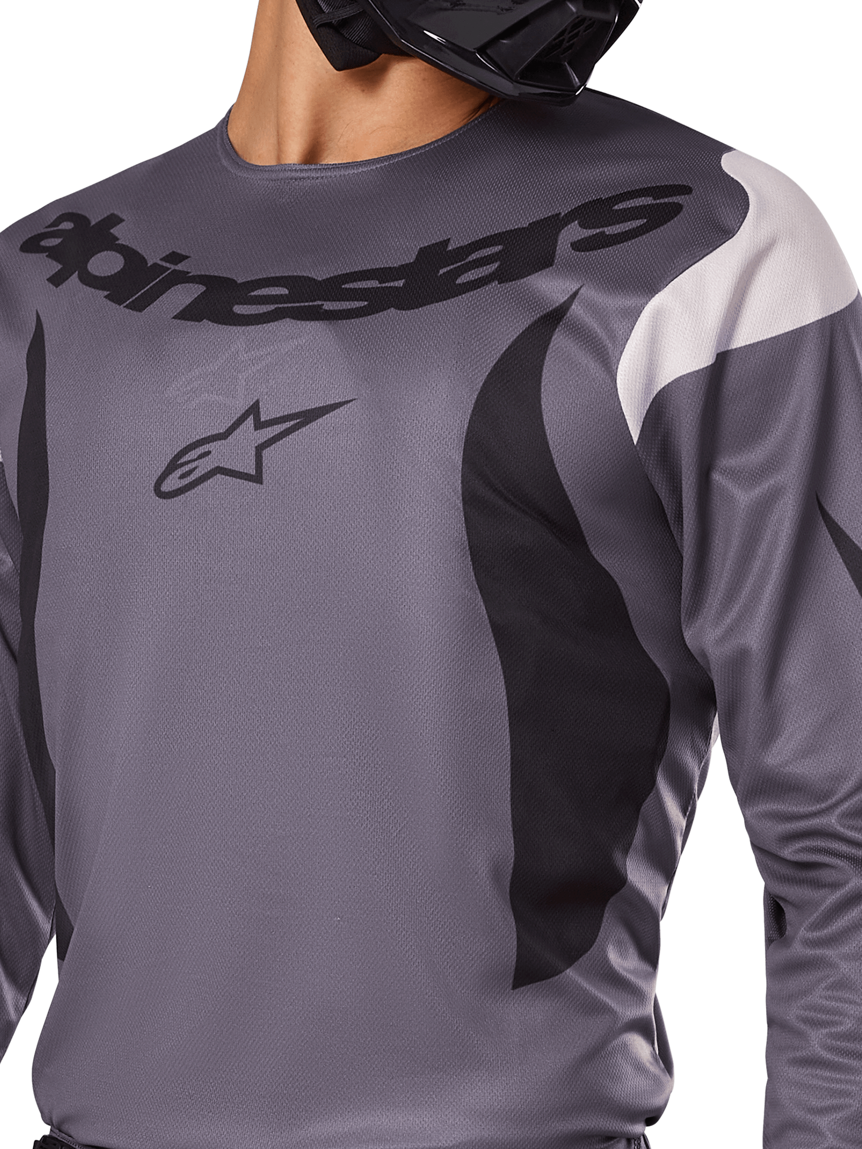 Alpinestars 2025 Fluid Haul Jersey, maglia da motocross, grigio con accenti neri e bianchi, con logo e scritta Alpinestars sul petto, vestibilità sportiva per gare off-road.
