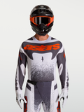 Alpinestars maglia Techstar Swan, maglia motocross uomo in bianco e grigio con dettagli rosso fluo, vestibilità da gara.