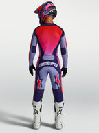 Alpinestars Racer Air Hunt JGear Set, completo motocross ventilato viola e rosso, vista posteriore su pilota