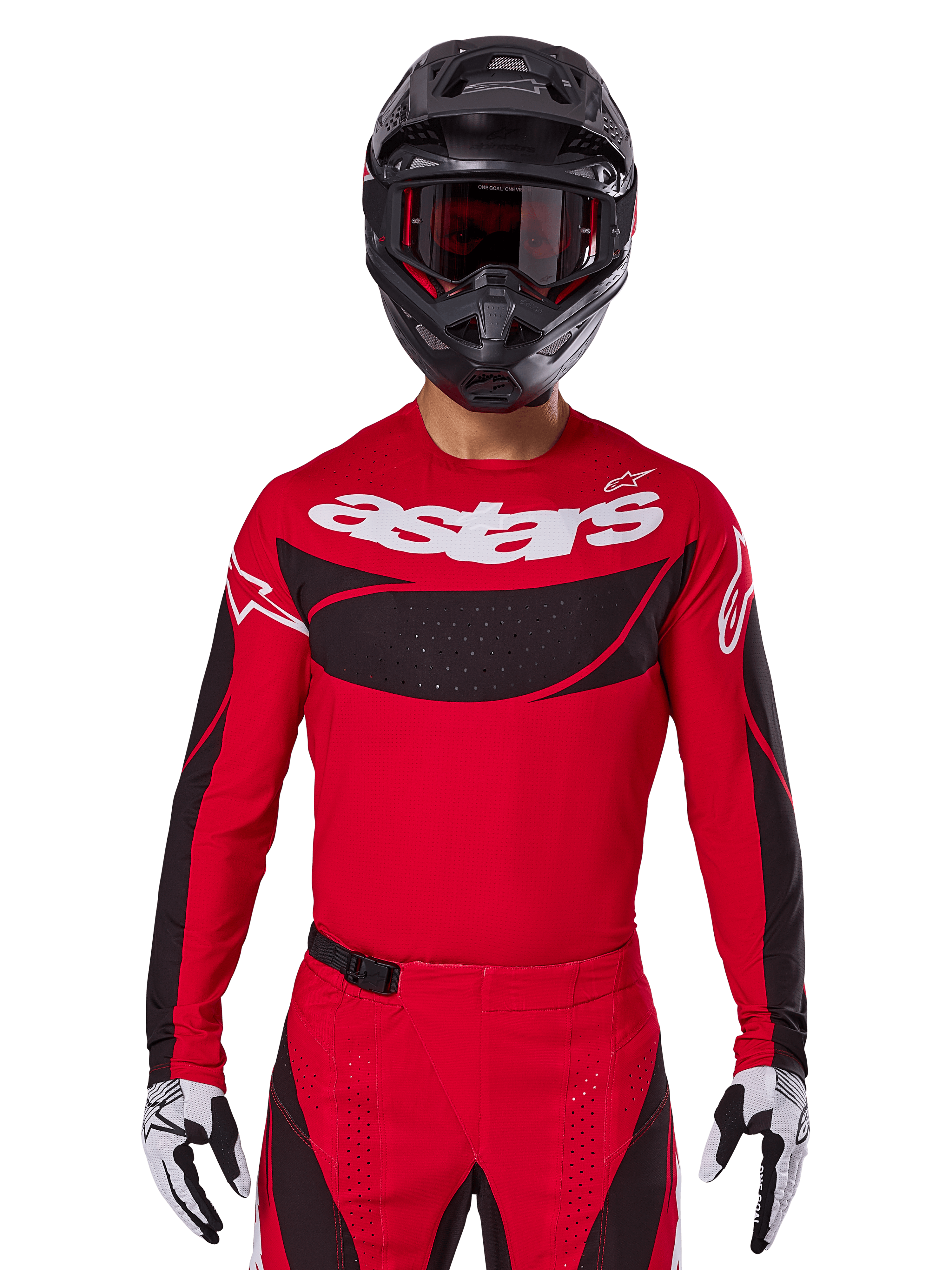 Alpinestars 2025 Techstar Dreem Jersey, maglia da motocross, rosso acceso e nero, con logo 'astars' bianco e pannello ventilato nero sul petto, indossata con pantaloni coordinati, casco nero e guanti bianchi e neri, per gare off-road professionali