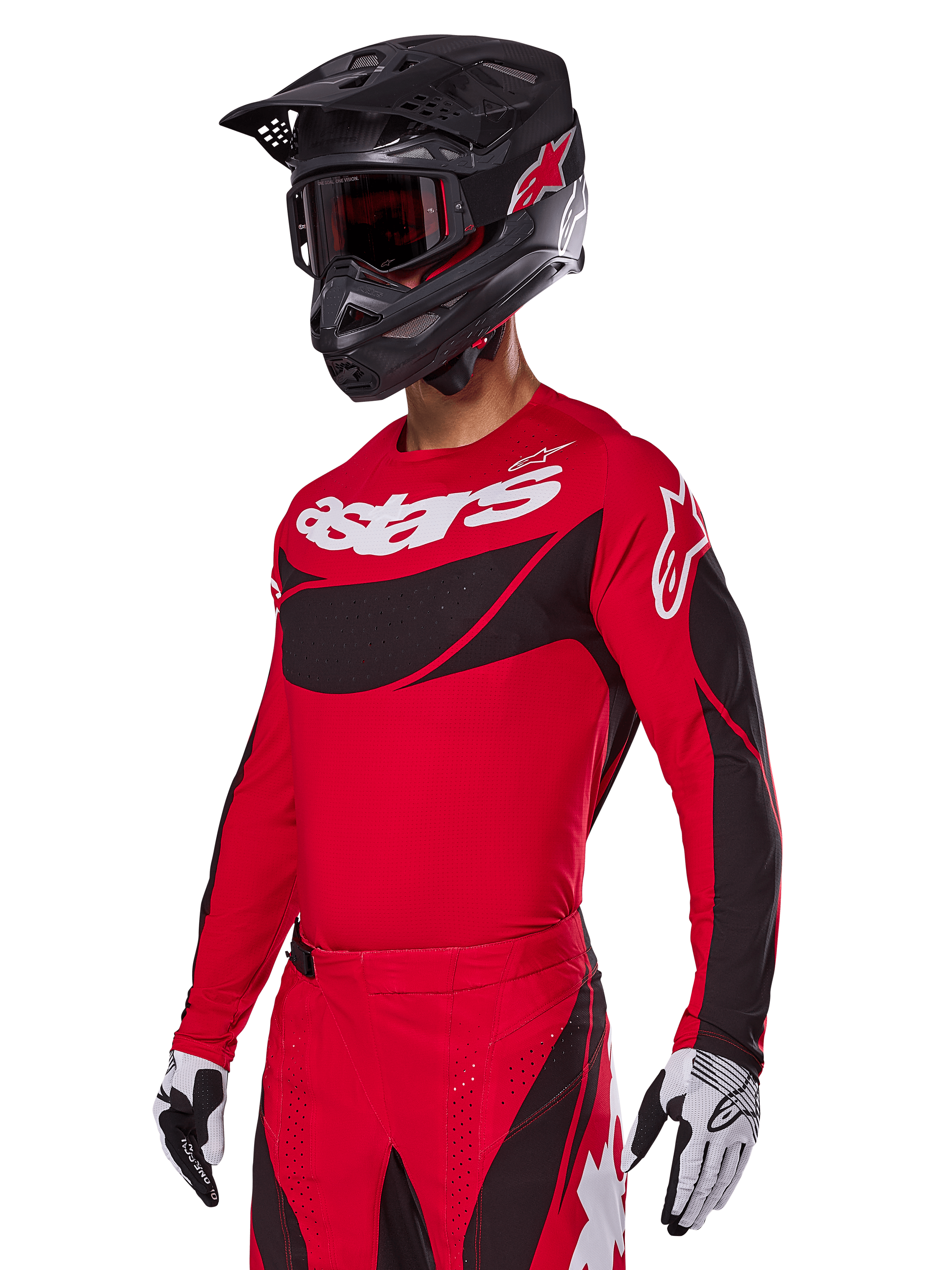 Set completo Alpinestars Techstar Dreem 2025, maglia e pantaloni da motocross rossi con accenti neri e bianchi, indossati con casco e occhiali neri, guanti bianchi e neri, con logo 'astars' in evidenza, progettato per gare off-road ad alte prestazioni