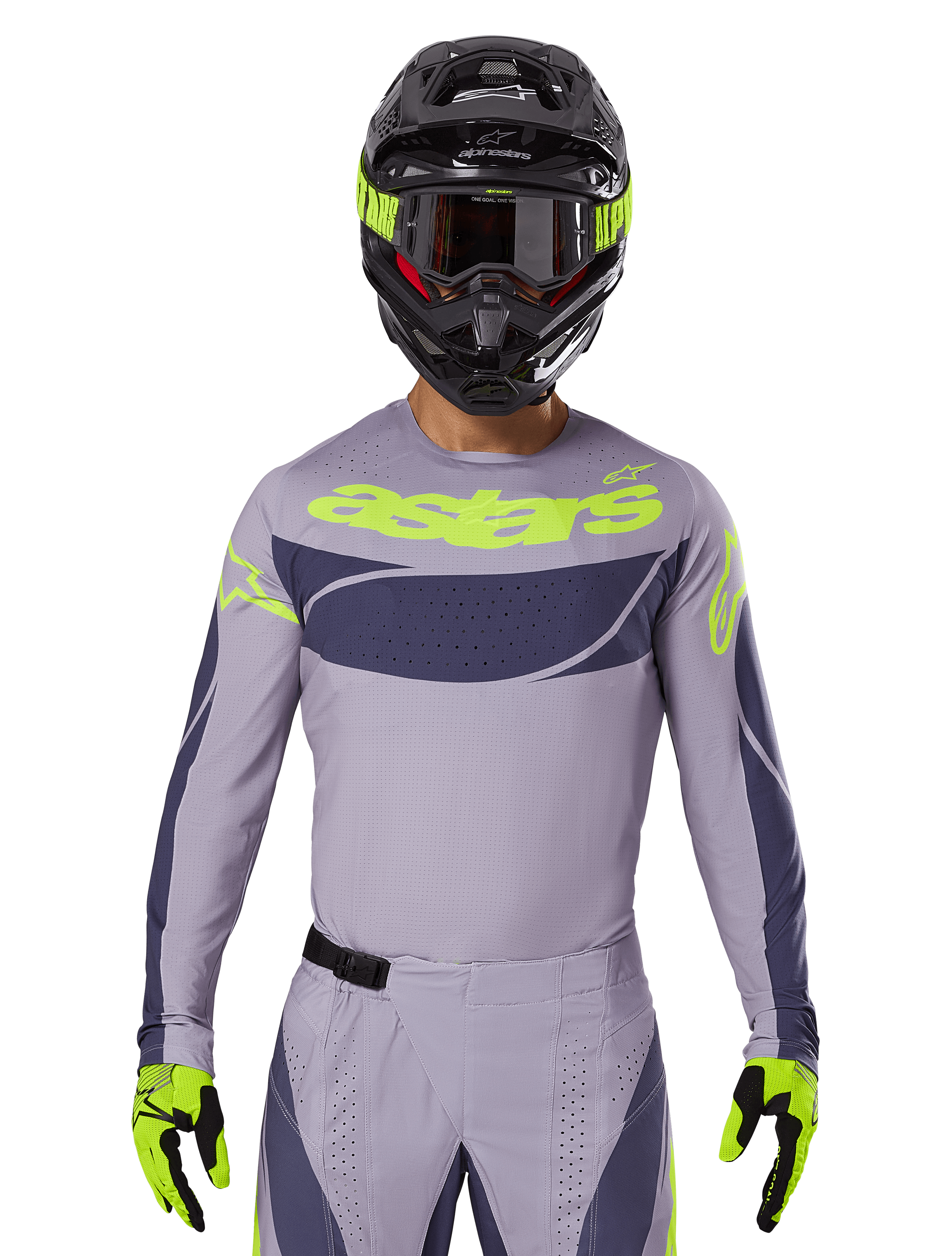 Maglia e set gear Techstar Dreem 2025, completo da gara motocross, grigio chiaro e grigio scuro con dettagli giallo neon, marchio 'astars', indossato con casco nero, occhiali e guanti coordinati, materiale tecnico traforato per prestazioni off-road