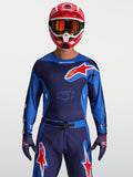 Alpinestars Maglia Racer Hunt, maglia da motocross da uomo blu e rossa, tessuto anti-umidità con vestibilità racing e casco coordinato.