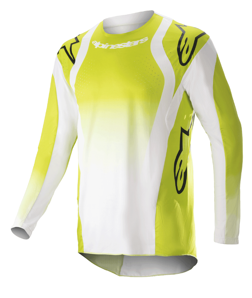 Alpinestars maglia Techstar Push 2023, maglia da motocross a maniche lunghe, giallo fluo e bianco, con grandi loghi Astars neri su spalle e maniche, tessuto tecnico traforato, scollo rotondo e orlo posteriore allungato per gare fuoristrada