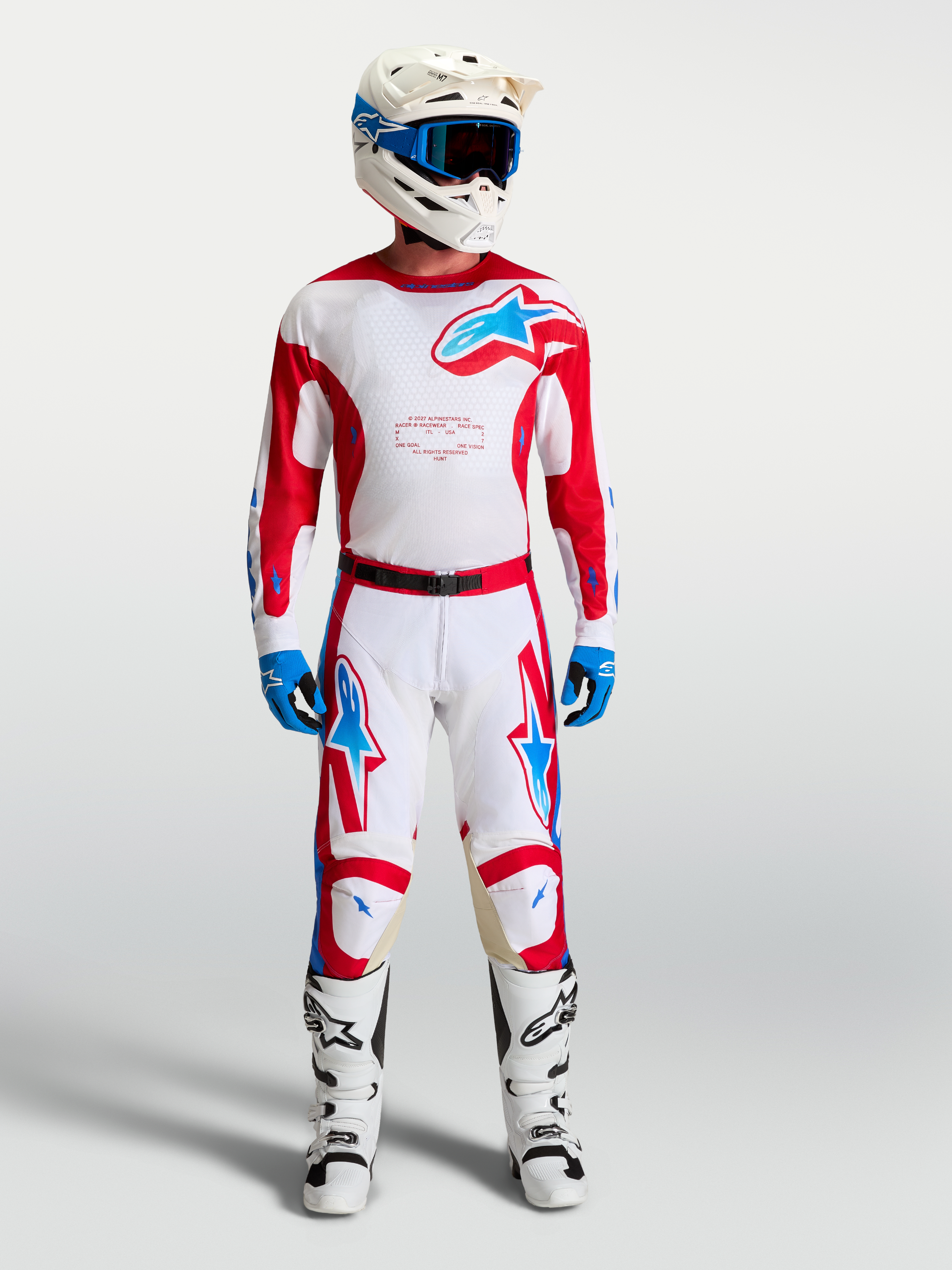 Alpinestars Pantaloni Racer Hunt, pantaloni da motocross uomo, bianchi e rossi con dettagli blu, vestibilità pre-curvata.