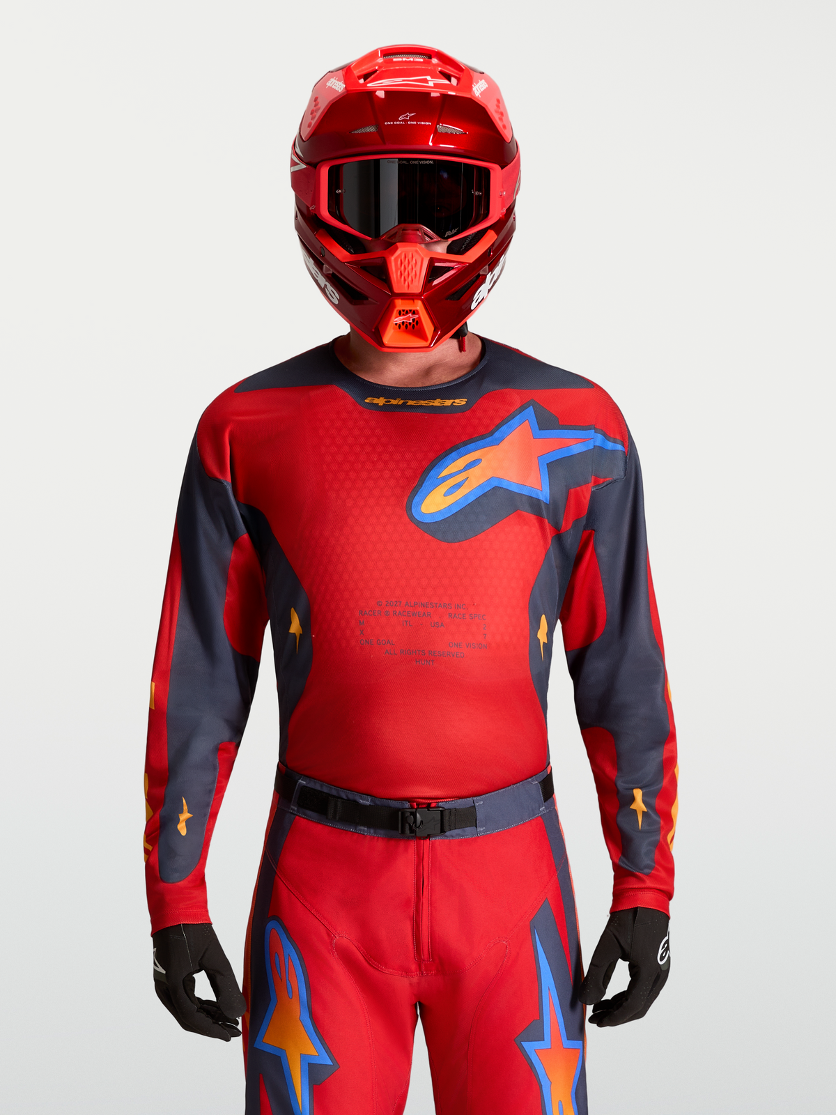 Alpinestars Maglia Racer Hunt, maglia da motocross da uomo rossa e grigia, tessuto traspirante e rete ventilata.