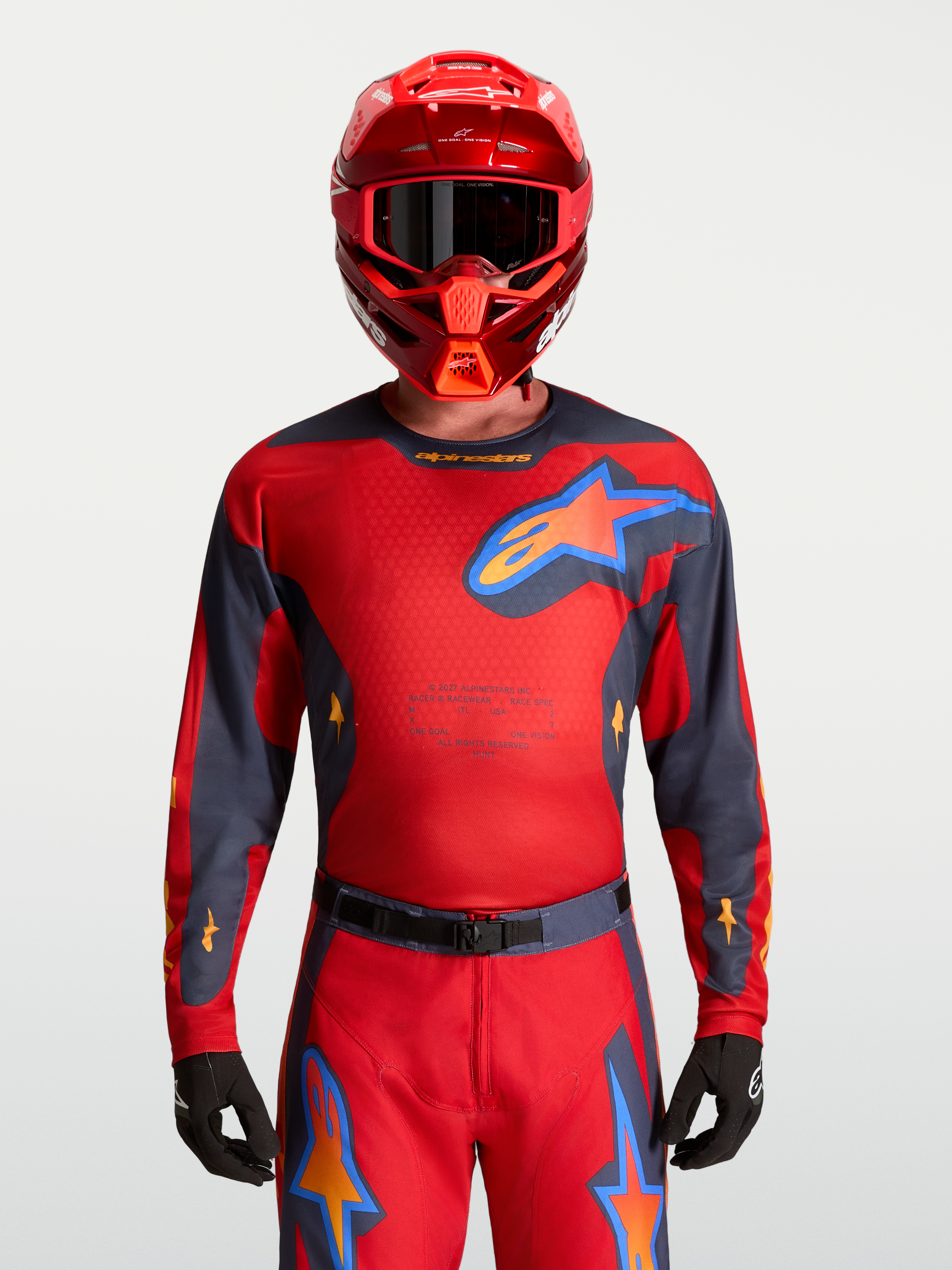 Alpinestars Maglia Racer Hunt, maglia da motocross da uomo rossa e grigia, tessuto traspirante e rete ventilata.