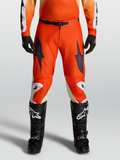Alpinestars Pantaloni Racer Amber 2027, pantaloni da motocross rossi in tessuto 600D e vestibilità pre-curvata, indossati