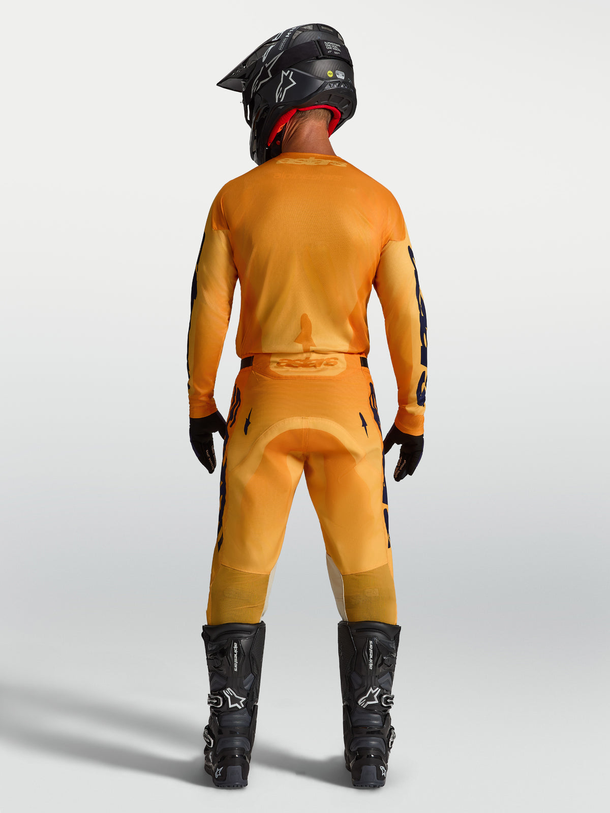 Alpinestars Completo Racer Amber 2027, abbigliamento motocross uomo, arancione e blu scuro, vista posteriore completa.