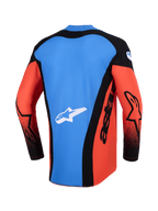 Maglia Alpinestars Techstar Knif 2026, maglia da motocross, vista posteriore in arancione, nero e blu UCLA, caratterizzata da un pannello posteriore blu con logo a stella bianco, pannelli laterali neri con marchio 'astars' e maniche arancioni con accenti neri, abbigliamento tecnico leggero per gare off-road.