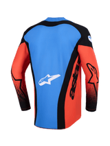 Maglia Alpinestars Techstar Knif 2026, maglia da motocross, vista posteriore in arancione, nero e blu UCLA, caratterizzata da un pannello posteriore blu con logo a stella bianco, pannelli laterali neri con marchio 'astars' e maniche arancioni con accenti neri, abbigliamento tecnico leggero per gare off-road.