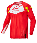 Alpinestars Techstar Factory Jersey, maglia da motocross, rosso fluo con pannello bianco sul petto e dettagli giallo fluo, tessuto mesh leggero e traspirante, design a maniche lunghe per gare fuoristrada