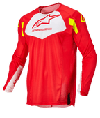 Alpinestars Techstar Factory Jersey, maglia da motocross, rosso fluo con pannello bianco sul petto e dettagli giallo fluo, tessuto mesh leggero e traspirante, design a maniche lunghe per gare fuoristrada