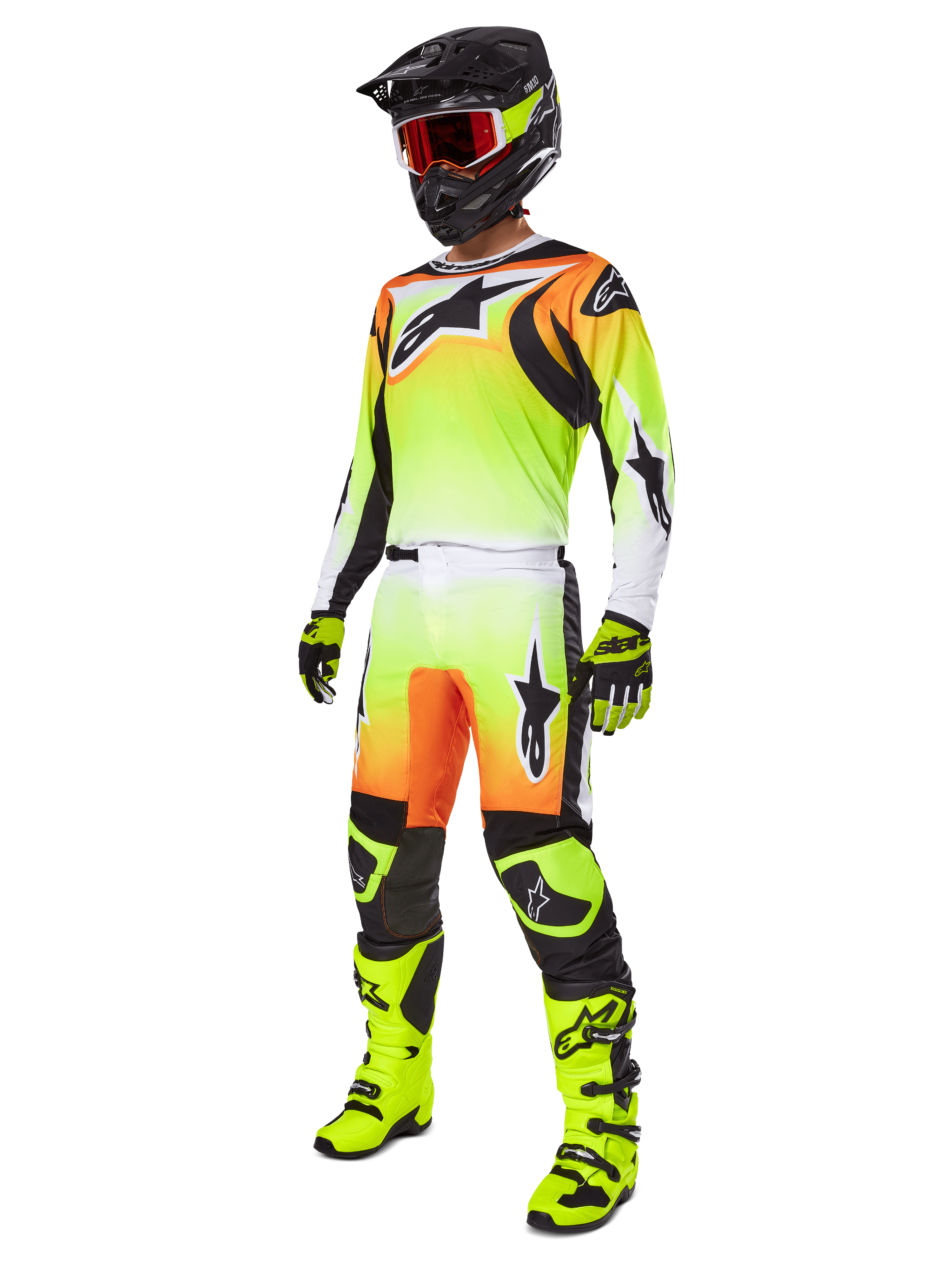 Alpinestars 2025 Fluid Wurx Gear Set, completo da motocross, sfumatura giallo neon e arancione, kit completo con maglia e pantaloni, casco nero con occhiali arancioni, stivali e guanti giallo neon, design atletico per prestazioni fuoristrada