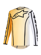 Alpinestars Fluid Apex Jersey 2026, maglia da motocross, sfumatura giallo e bianco con accenti neri, caratterizzata da un grande logo a stella nero sul petto, bordi neri marcati lungo le cuciture e branding Alpinestars sulle maniche, maglia tecnica a maniche lunghe per gare off-road